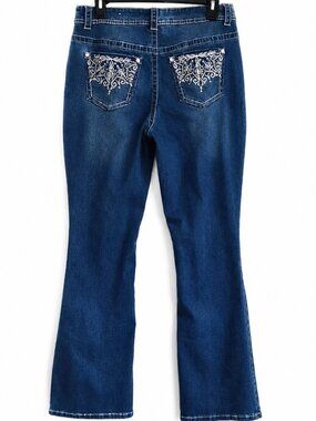 Size 10 womens denim blue jeans. Faded bootcut "Curvy" long pants. Western